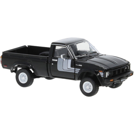 Toyota Hilux (RHD with Extra Wheels and Bumpers 1980) in Black